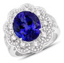tanzanite and white diamond flower halo ring in 18k white gold