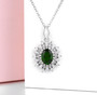 chrome diopside and white zircon halo pendant necklace in rhodium over sterling silver shown in a lifestyle photo
