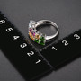 multi gemstone cluster band ring in rhodium over sterling silver shown for size comparison