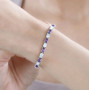 amethyst and ethiopian opal oval tennis bracelet in rhodium over sterling silver