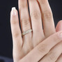 yellow diamond stackable skinny band ring in rhodium over sterling silver worn on a hand