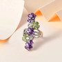 amethyst peridot and zircon elongated floral cluster ring in rhodium over sterling silver shown in a lifestyle photo