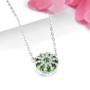 side view of chrome diopside and white zircon cluster necklace in rhodium over sterling silver