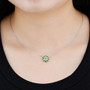 chrome diopside and white zircon cluster necklace in rhodium over sterling silver worn around the neck