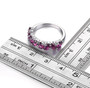 rhodolite garnet and white zircon cluster band ring in rhodium over sterling silver shown for size comparison