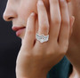 marquise and round diamond three ring set in 14k white gold worn on a model
