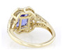 back view of emerald cut tanzanite and diamond halo ring in 14k yellow gold