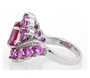 side view of pink topaz and lab sapphire bypass ring in rhodium over sterling silver