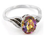 angled view of mystic quartz champagne and white diamond ring in black and white rhodium over sterling silver