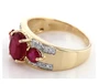 side view of ruby (ff) three stone and diamond ring in 10k yellow gold