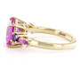 side view of lab pink sapphire and amethyst ring in 18k yellow gold over sterling silver