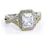front view of emerald and round cubic zirconia engagement ring in 18k yellow gold and rhodium over sterling silver