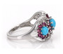 side view of turquoise rhodolite garnet and zircon cluster ring in rhodium over sterling silver