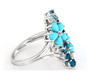 side view of turquoise london blue topaz and zircon cluster ring in rhodium over sterling silver