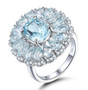 aquamarine and white zircon halo ring in rhodium over sterling silver