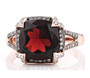 front view of garnet champagne and white diamond halo ring in 14k rose gold