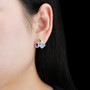 multi gemstone halo earrings in rhodium over sterling silver worn on the ear