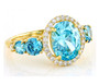 front view of blue and white cubic zirconia ring in 18k yellow gold over sterling silver