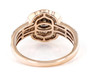 back view of champagne and white diamond halo ring in 10k rose gold