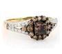 front view of champagne and white diamond halo ring in 10k yellow gold