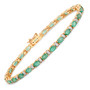 emerald and diamond tennis bracelet in 14k yellow gold with oval green emeralds and white diamond accents
