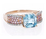 front view of blue zircon pink sapphire and diamond ring in 10k rose gold