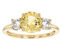 front view of heliodor and white zircon trilogy ring in 10k yellow gold