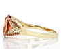 side view of red labradorite red diamond and zircon ring in 10k yellow gold