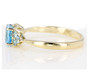 side view of sky blue topaz cluster ring in 10k yellow gold