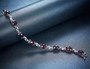 full view of garnet bracelet in rhodium over sterling silver
