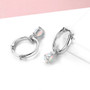 side view of ethiopian opal pear huggie dangle earrings in rhodium over sterling silver