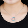 sky blue topaz and zircon heart necklace in rhodium over sterling silver worn around the neck