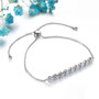 back view of aquamarine and zircon bolo bracelet in rhodium over sterling silver