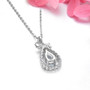 back view of aquamarine and zircon bow pendant necklace in rhodium over sterling silver