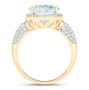oval aquamarine and diamond halo ring in 14k yellow gold