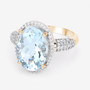oval aquamarine and diamond halo ring in 14k yellow gold
