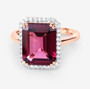 angled view of rhodolite garnet and diamond halo ring in 14k rose gold