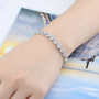 sky blue topaz 5mm round rhodium over sterling silver tennis bracelet