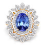 front view of oval tanzanite and diamond double halo ring in 14k yellow gold