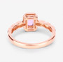 back view of emerald cut pink sapphire and diamond halo ring in 14k rose gold