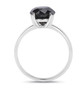 side view of round black diamond solitaire ring in 14k white gold