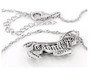 back view of black spinel and white cz zebra pendant necklace in black and white rhodium over sterling silver