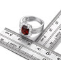 garnet halo ring in rhodium over 925 sterling silver shown for size comparison