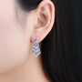 tanzanite and white zircon dangle earrings in rhodium over sterling silver