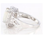 side view of ethiopian opal and white topaz halo ring in rhodium over sterling silver