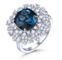 london blue topaz and white zircon halo ring in rhodium over sterling silver
