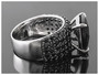 side view of black spinel ring in black and white rhodium over sterling silver