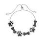 black spinel and zircon puppy paw print and dog bone bolo bracelet in black and white rhodium over sterling silver