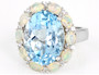 front view of sky blue topaz ethiopian opal and white zircon halo ring in rhodium over sterling silver