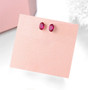 6x4mm oval ruby stud earrings in rhodium over sterling silver